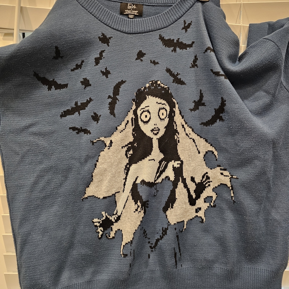 Unique Vintage Blue Sweater with Graphic Design